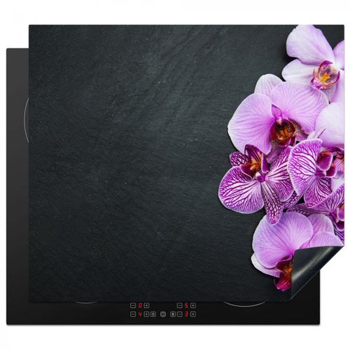 Protezione piano induzione - Composizione di orchidee a contrasto